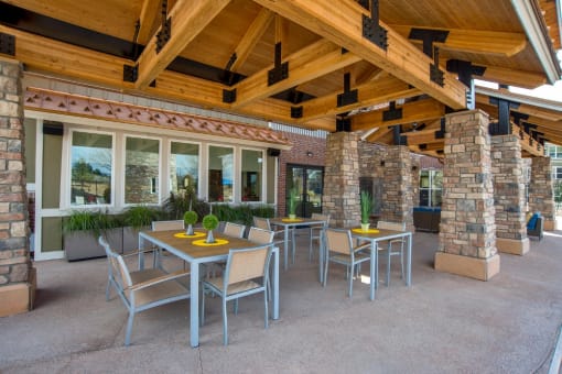 Resident Clubhouse Covered Patio with Seating at Longmont CO Apartment Rentals