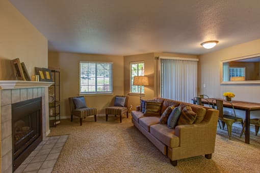 Living Area With Fireplace at Commons at Avalon Park Apartments, Tigard, OR, 97224