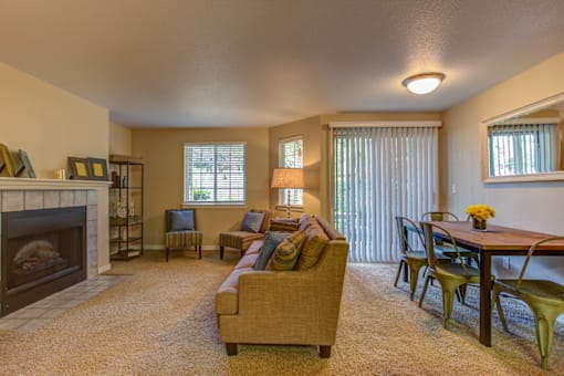Living Area With Fireplace View at Commons at Avalon Park Apartments, Tigard, OR