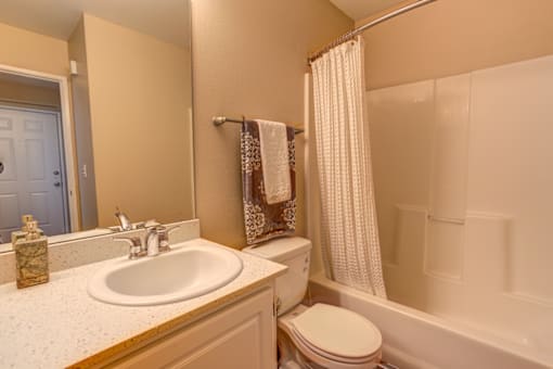 Bathroom area at Commons at Hawthorn Village Apartments, Hillsboro, OR