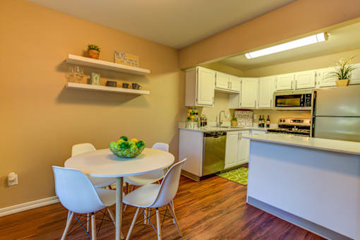 Dining table and chair at Commons at Hawthorn Village Apartments, Hillsboro, Oregon
