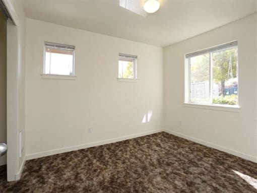 Bedroom with wooden flooring at CRESTVIEW COMMONS LP, Klamath Falls, Oregon