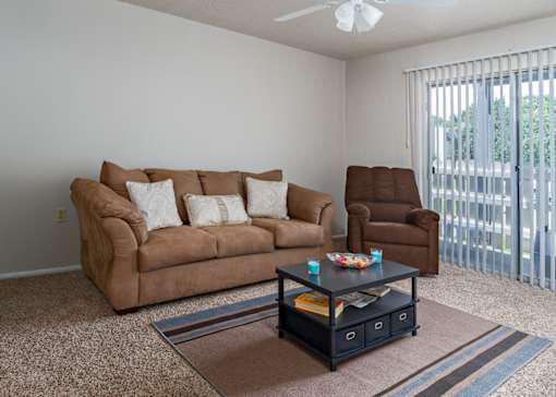 a living room with two couches and a coffee table