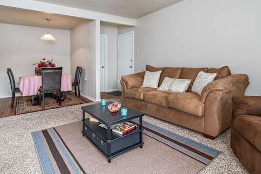 a living room with two couches and a coffee table