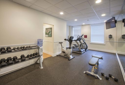 Gym with treadmills and other exercise equipment at Willett Apartments, Albany