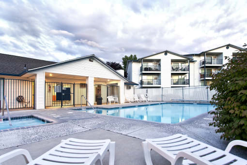 Westridge Apartments for rent in Clarkston, WA pool and white pool furniture