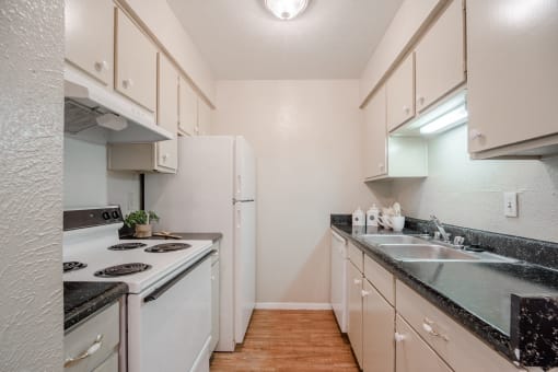 Fully equipped kitchen at Garden Park, Irving, 75062