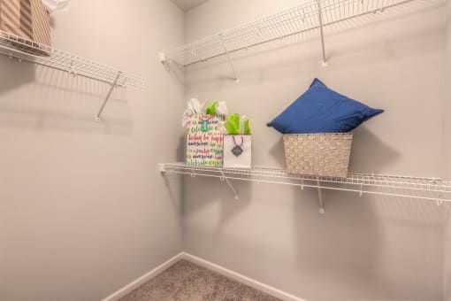 this is a photo of the closet with white racks  at EdgeWater at City Center, Lenexa, KS, 66219