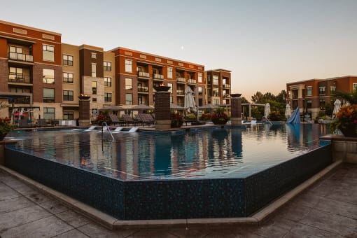 Relaxing Pool Area With Sundeck at The Royale at CityPlace, Overland Park, KS
