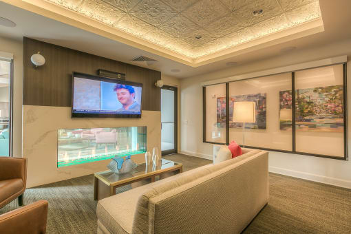 media lounge fireplace with seating  at Waterside Residences on Quivira, Lenexa, KS, 66215