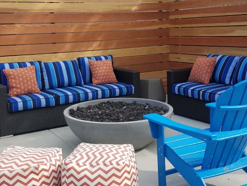 Outdoor fire pit with seating at Mission Trails Apartments San Diego, California, 92119