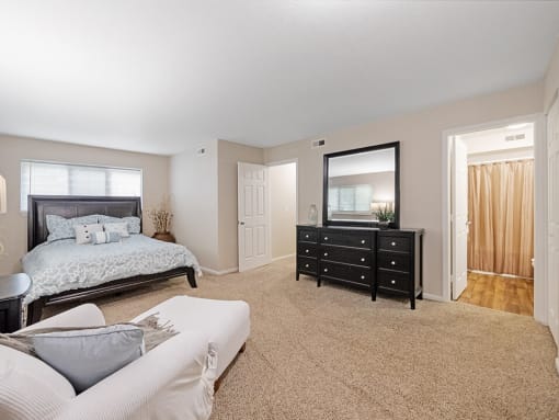 large primary bedroom with attached bathroom 