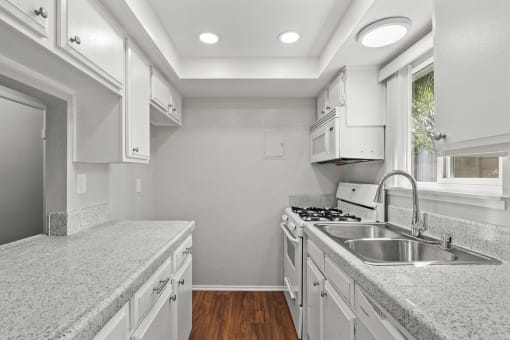 Upgraded Kitchen with White Cabinets