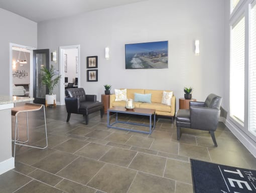 Stylish resident lounge offering comfortable seating, modern finishes, and inviting spaces to relax, work, or socialize.