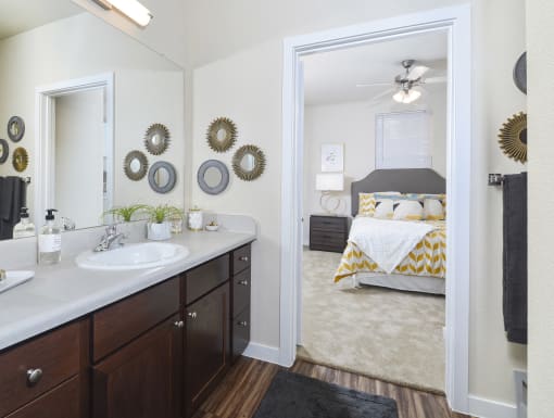 Spacious bathroom featuring an oversized vanity, abundant cabinet storage, and a clean, contemporary design.