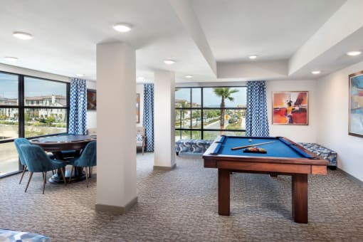 Springville Seniors Apartments Community Game Room on the 2nd floor with a Pool Table and Poker Table