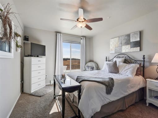 Bedroom with Queen Bed and Large Window