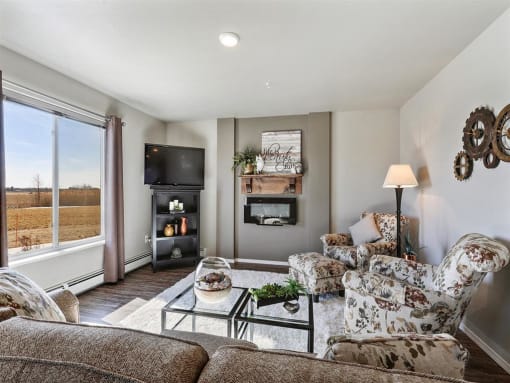 Living Room with Fireplace and Large Window