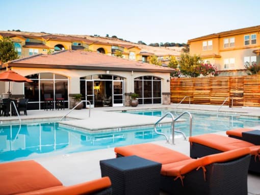 Apartments in El Dorado Hills, CA l Lesarra Apartments l Pool and lounge chairs 