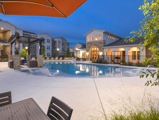 Swimming Pool with Lounge Chairs at Lucero, Texas