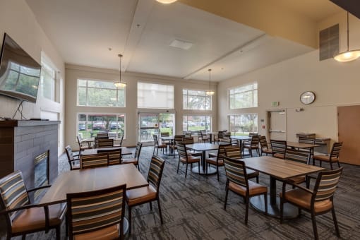 Social room with seating l Vintage at Vancouver Senior Apartments