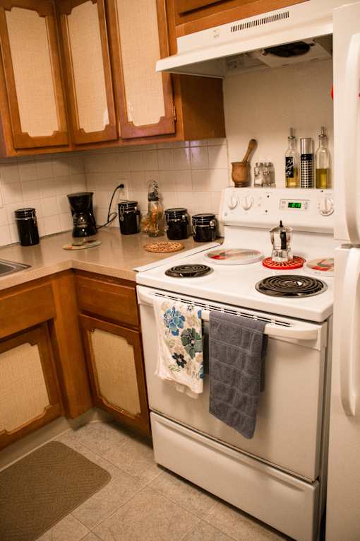 the kitchen with a white stove