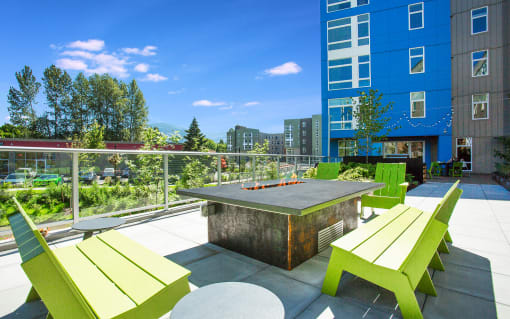 Issaquah WA Apartments for Rent-Atlas Apartments Courtyard With Fire Pit And Seating Areas With Surrounding Views