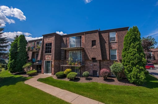 apartment exterior with beautiful landscaping