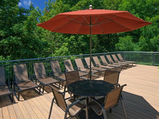 Sundeck with Umbrellas and Dining Tables at Parkridge Apartments, Oregon