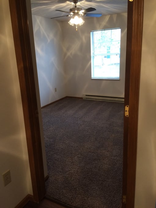 Image of large carpeted bedroom