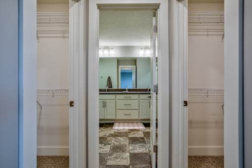 Bathroom and storage of Home For Rent in Holt Michigan | Aspen Lakes Estates