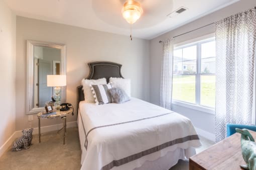 Spacious Bedroom With Comfortable Bed at Century Park Place Apartments, Morrisville