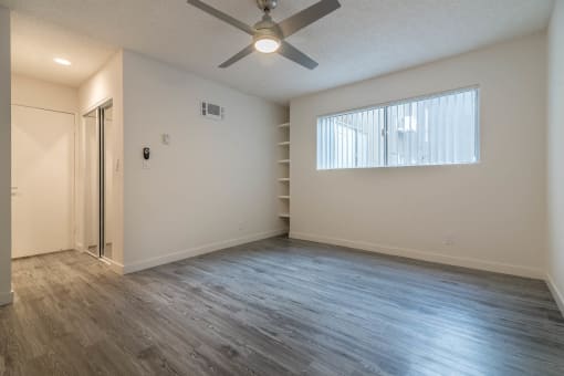 Bedroom area with large closet and built-in shelves