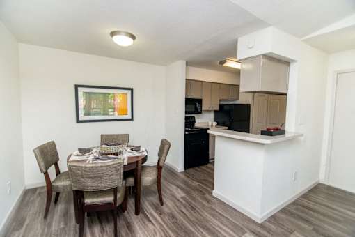 View of dining room and kitchen entrance.