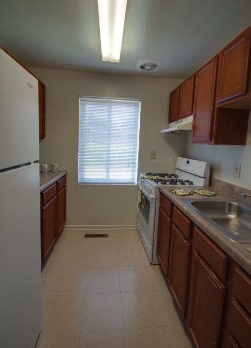 Functional galley kitchens at Cherrydale Apartments in Baltimore