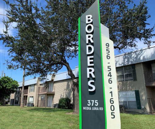 Borders Apartments sign on Media Luna Road Brownsville TX