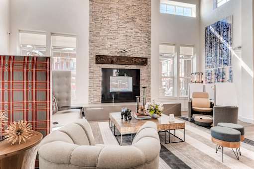 Modern living room with fireplace at Auburn Brook, Colorado, 80109