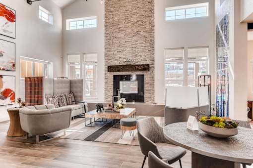 Modern clubhouse with stone fireplace at Auburn Brook, Castle Rock, 80109