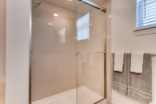 Bathroom with glass separated shower at Auburn Brook, Castle Rock, CO