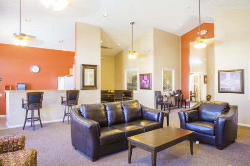 clubhouse lounge with couches at Northlake Farms Apartments, Gurnee, IL