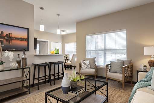 living room with glass coffee table and couch at Thirteen01 at Hartman Lakes, Shiloh, Illinois