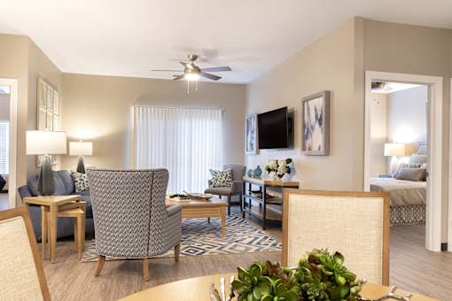 living room with window and ceiling fan at Thirteen01 at Hartman Lakes, Shiloh, IL, 62269