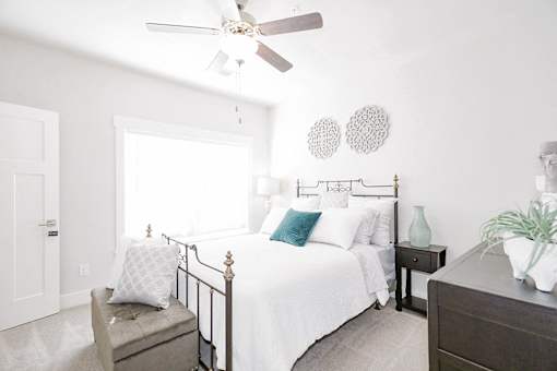 Bedroom with ceiling fan at McHenry Square Apartments, Augusta, Georgia