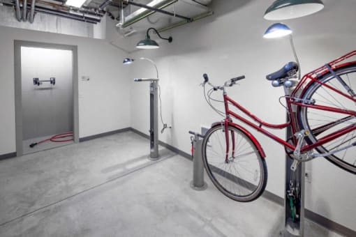 The Wilmore bike locker room with bike hanging