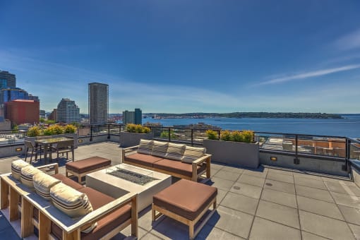O2 Apartments Rooftop Patio and Seating Area with Water View