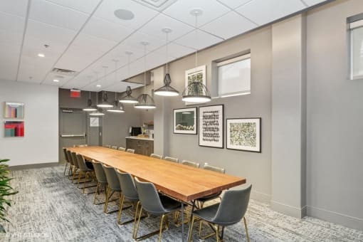 a conference room with a long table and chairs at 3333 Wisconsin, Washington, DC, 20016