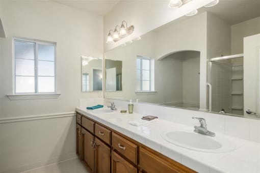 Bathroom with Vanity Lights at Dartmouth Tower at Shaw, Clovis, CA