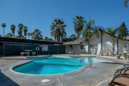 Outdoor Swimming Pool at Reef Apartments, Fresno, CA, 93704