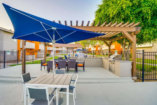 Poolside Sundeck And Grilling Area at Pacific Trails Luxury Apartment Homes, Covina, CA, 91722