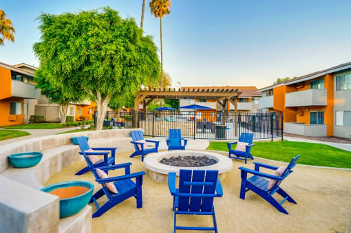 Blue Chairs And  Round Firepit at Pacific Trails Luxury Apartment Homes, Covina